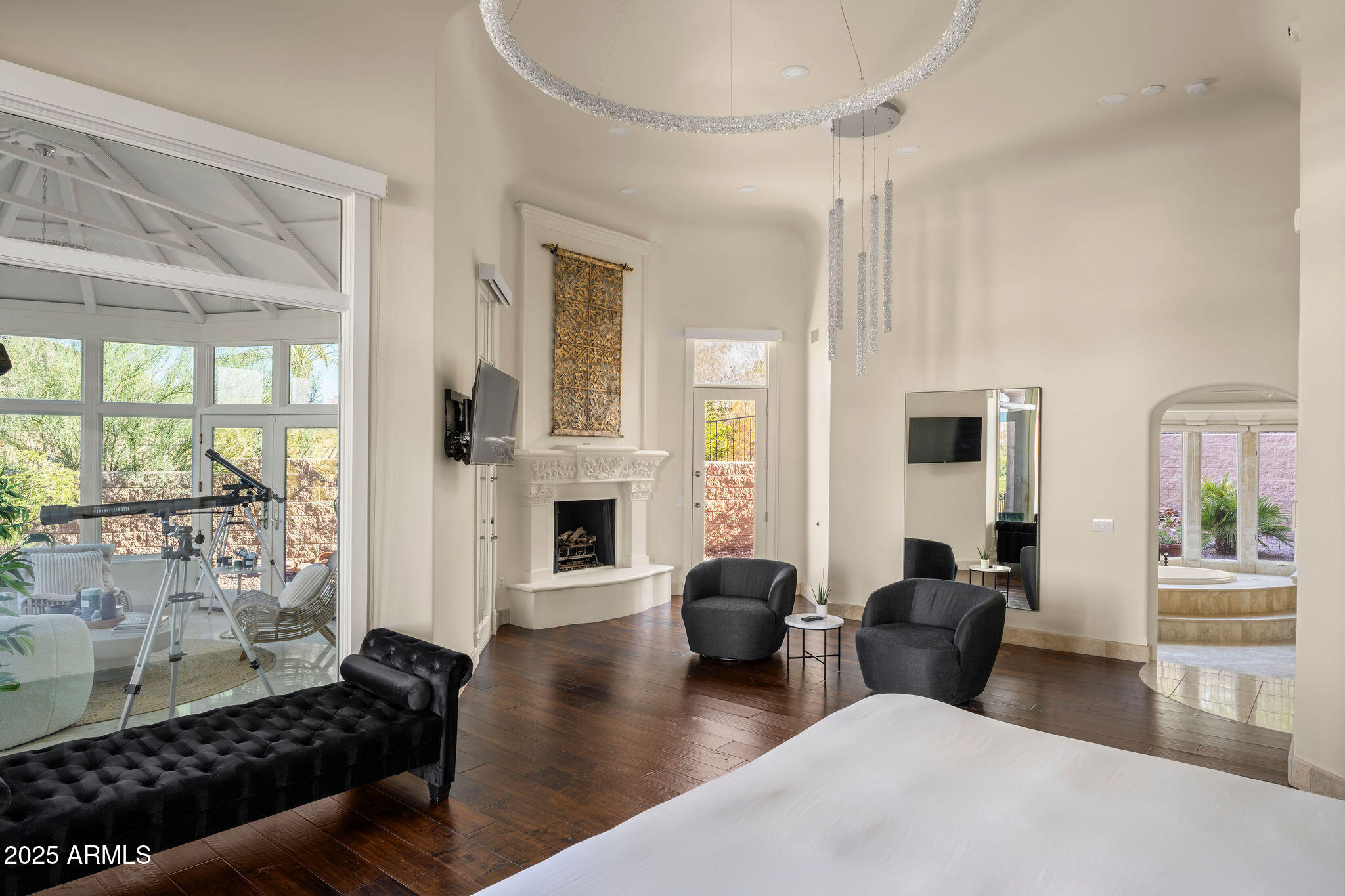 4490 East Valley Vista Lane Paradise Valley, AZ 85253 - Photo 25 of 45 a living room with furniture or couch and a fireplace