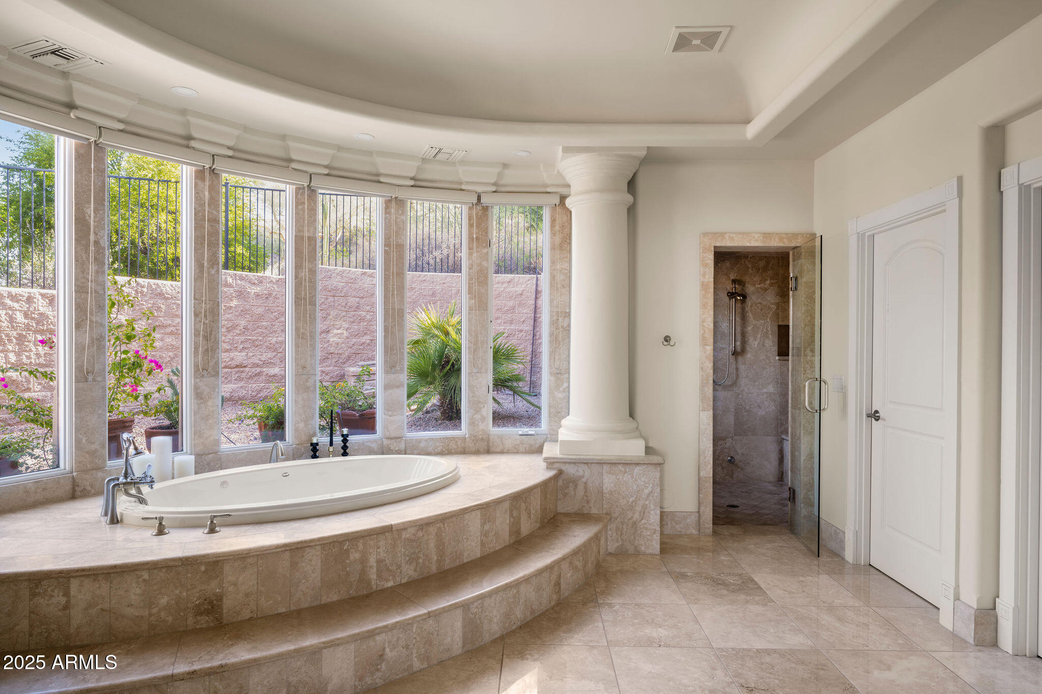 4490 East Valley Vista Lane Paradise Valley, AZ 85253 - Photo 27 of 45 a spacious bathroom with a tub and sink