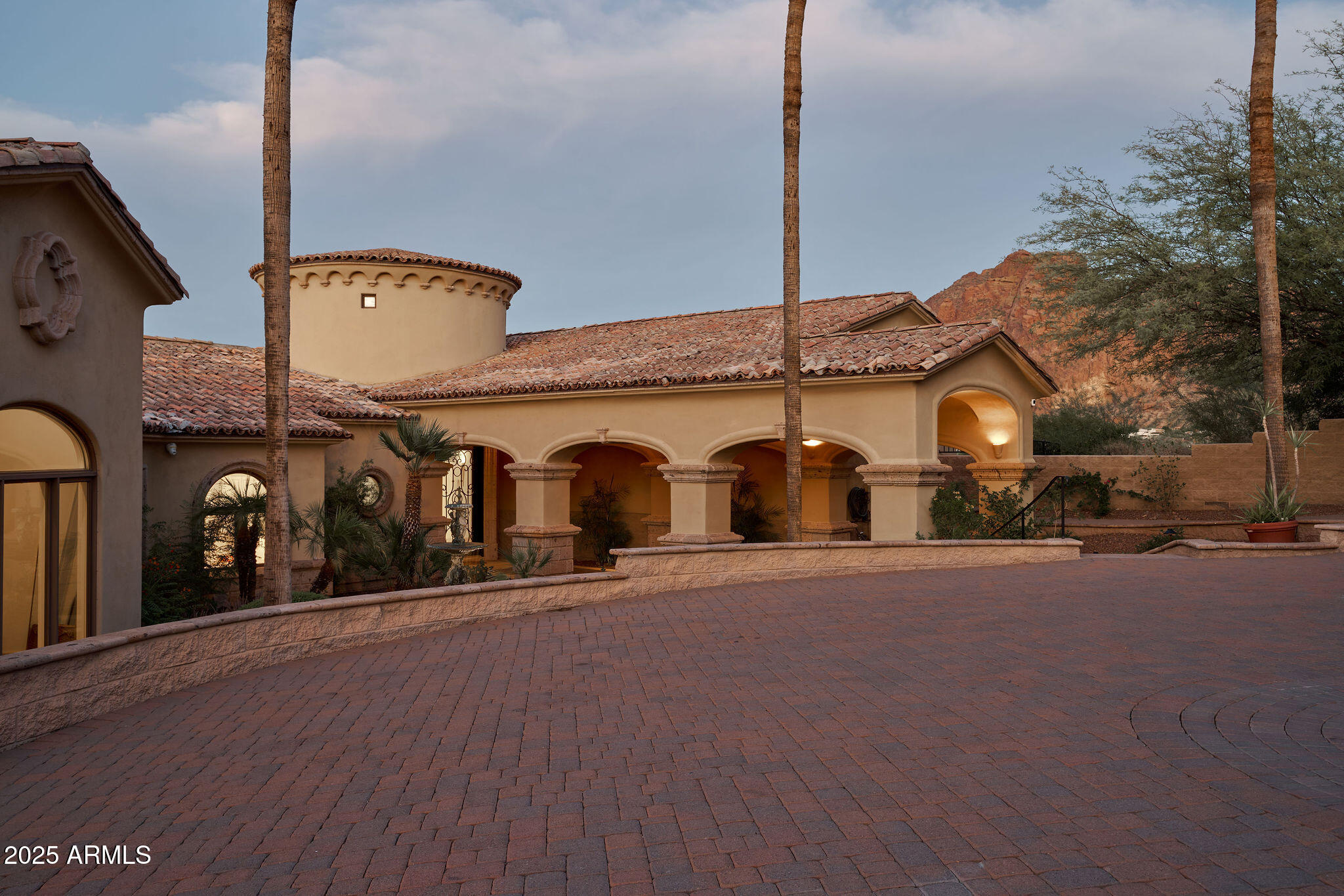 4490 East Valley Vista Lane Paradise Valley, AZ 85253 - Photo 3 of 45 a front view of a house with a yard