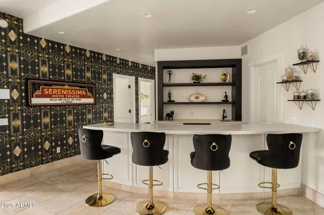 a living room with fireplace furniture and a flat screen tv