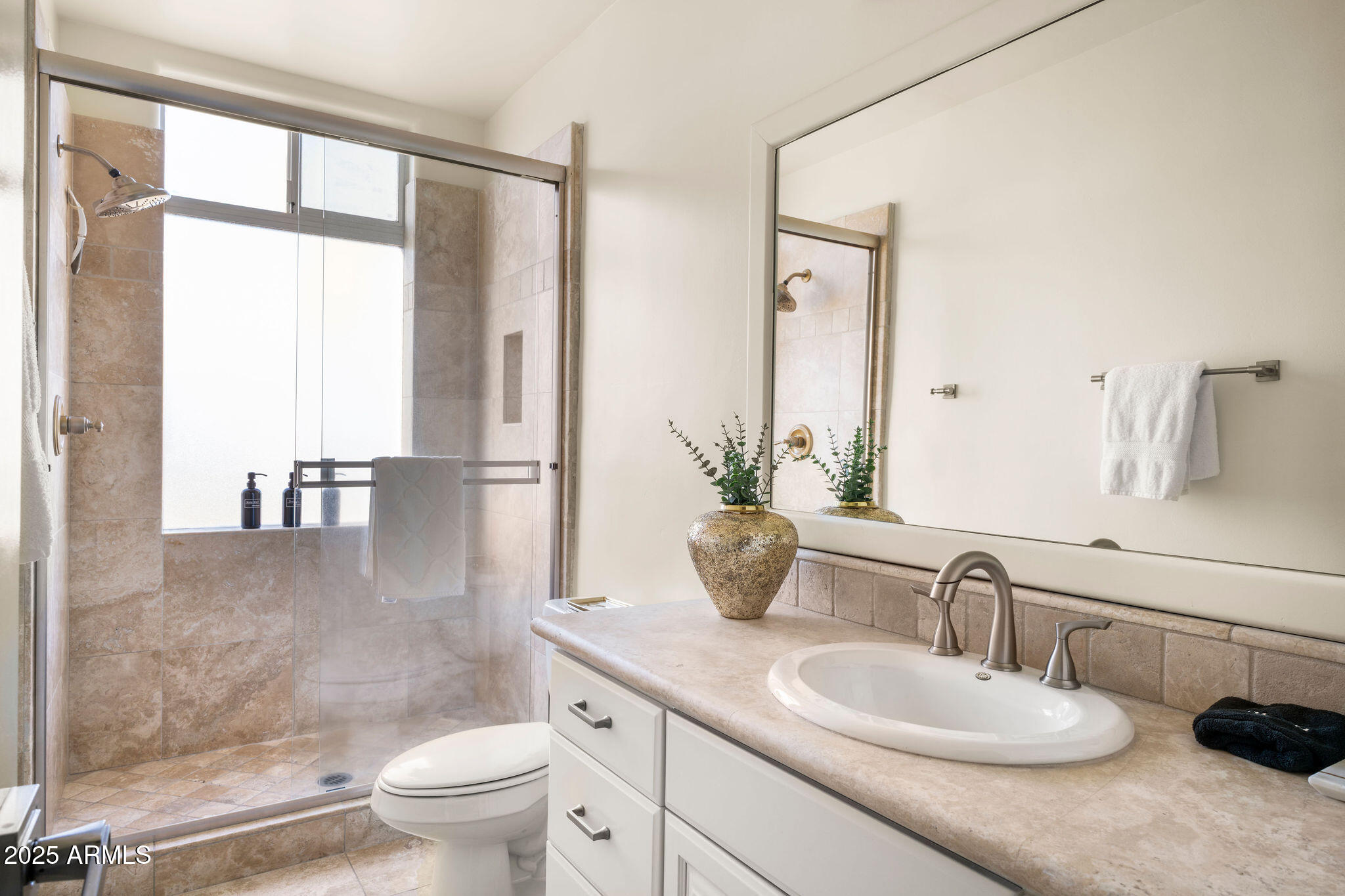 4490 East Valley Vista Lane Paradise Valley, AZ 85253 - Photo 42 of 45 a bathroom with a granite countertop sink toilet and mirror