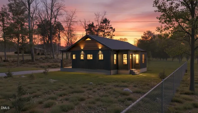 a pathway of a house with a yard
