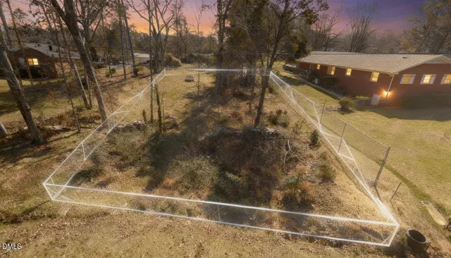 a front view of a house with yard