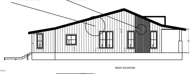 a black and white photo of a living room