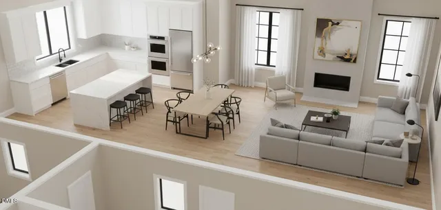 a view of a dining room with furniture and window