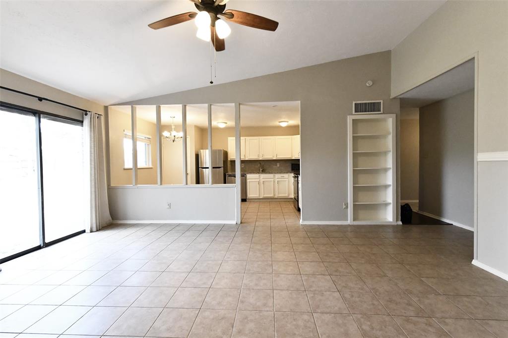 4113 Juneberry Street Fort Worth, TX 76137 - Photo 16 of 36 a view of an empty room with a window