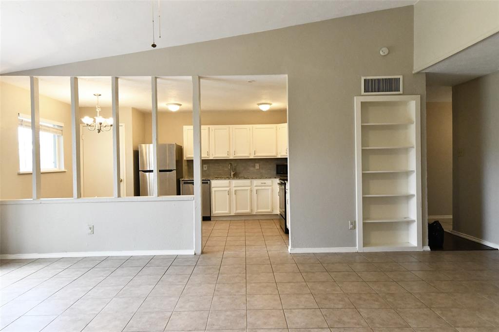 4113 Juneberry Street Fort Worth, TX 76137 - Photo 17 of 36 a view of an empty room with a window