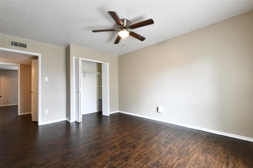4113 Juneberry Street Fort Worth, TX 76137 - Photo 32 of 36 a view of an empty room with wooden floor