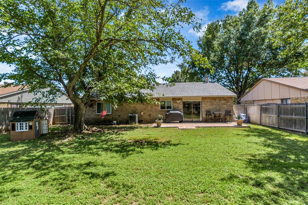 4113 Juneberry Street Fort Worth, TX 76137 - Photo 6 of 36 a house view with a sitting space and garden