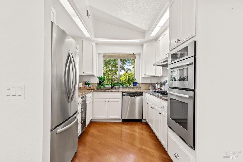 2123 Stonefield Lane Santa Rosa, CA 95403 - Photo 33 of 74 Updated kitchen with granite countertops and stainless steel appliances.