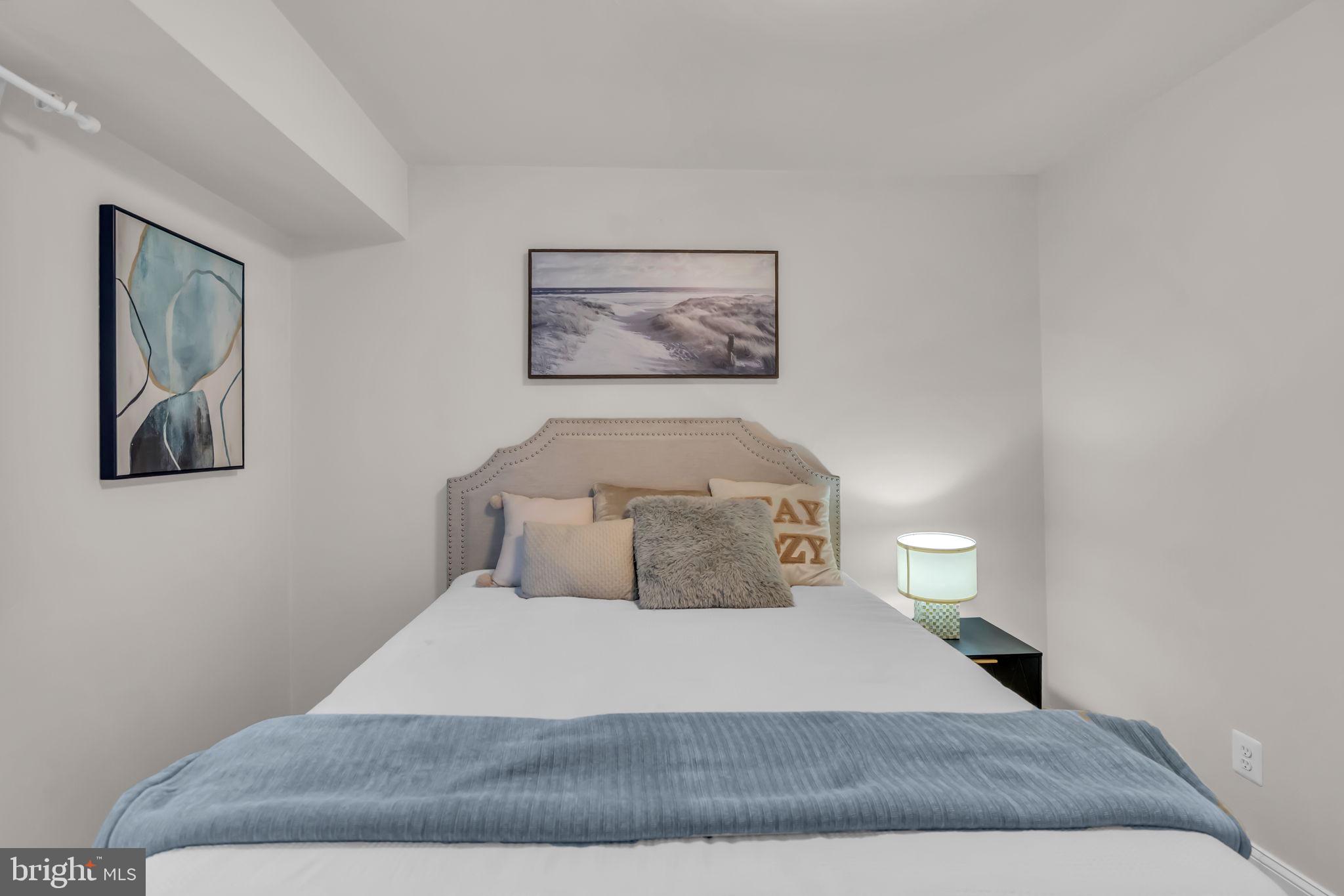 2910 Kings Chapel Road, Unit 5 Falls Church, VA 22042 - Photo 13 of 25 a bedroom with a bed and night stand