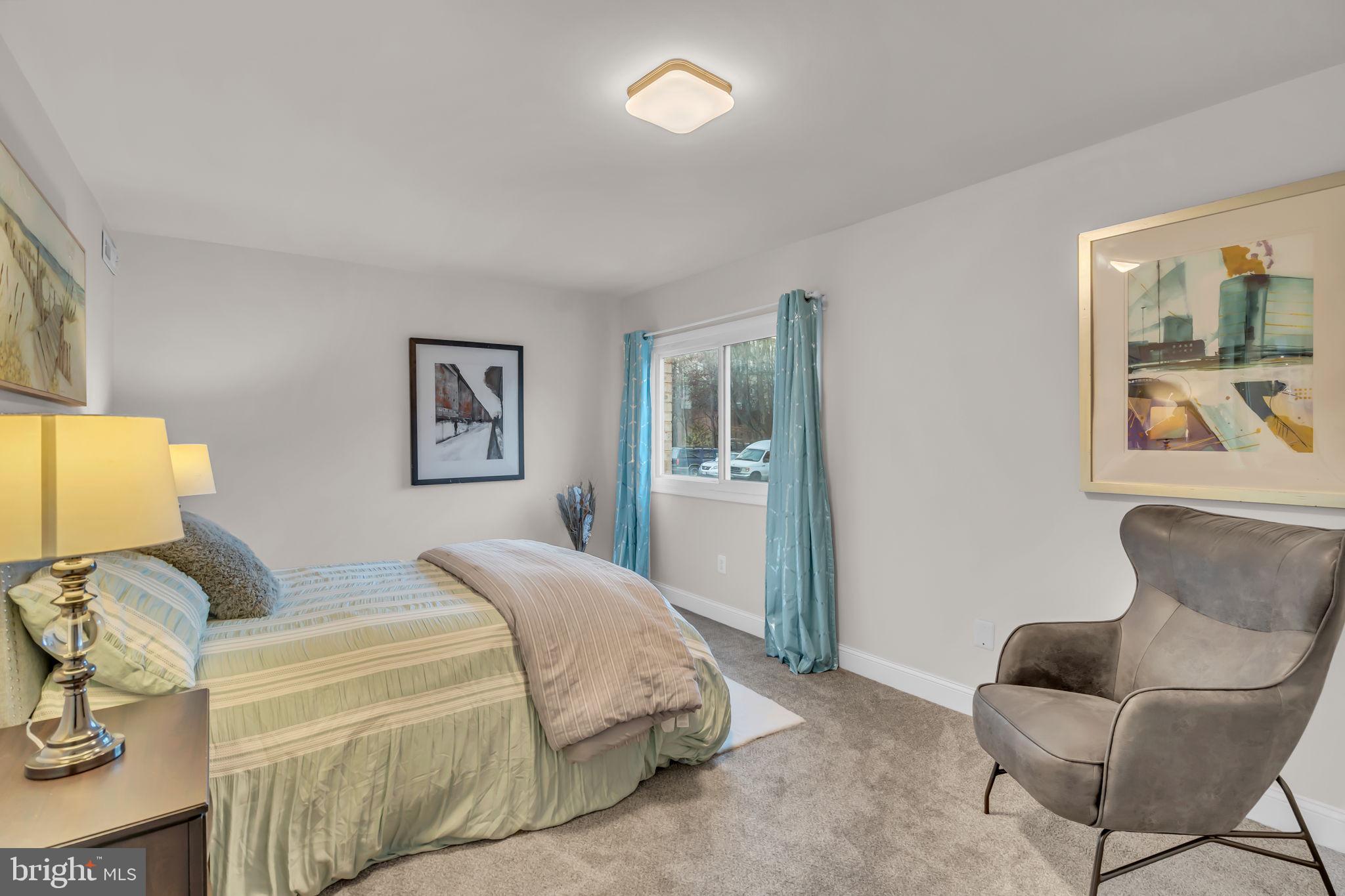 2910 Kings Chapel Road, Unit 5 Falls Church, VA 22042 - Photo 19 of 25 a spacious bedroom with a bed and furniture