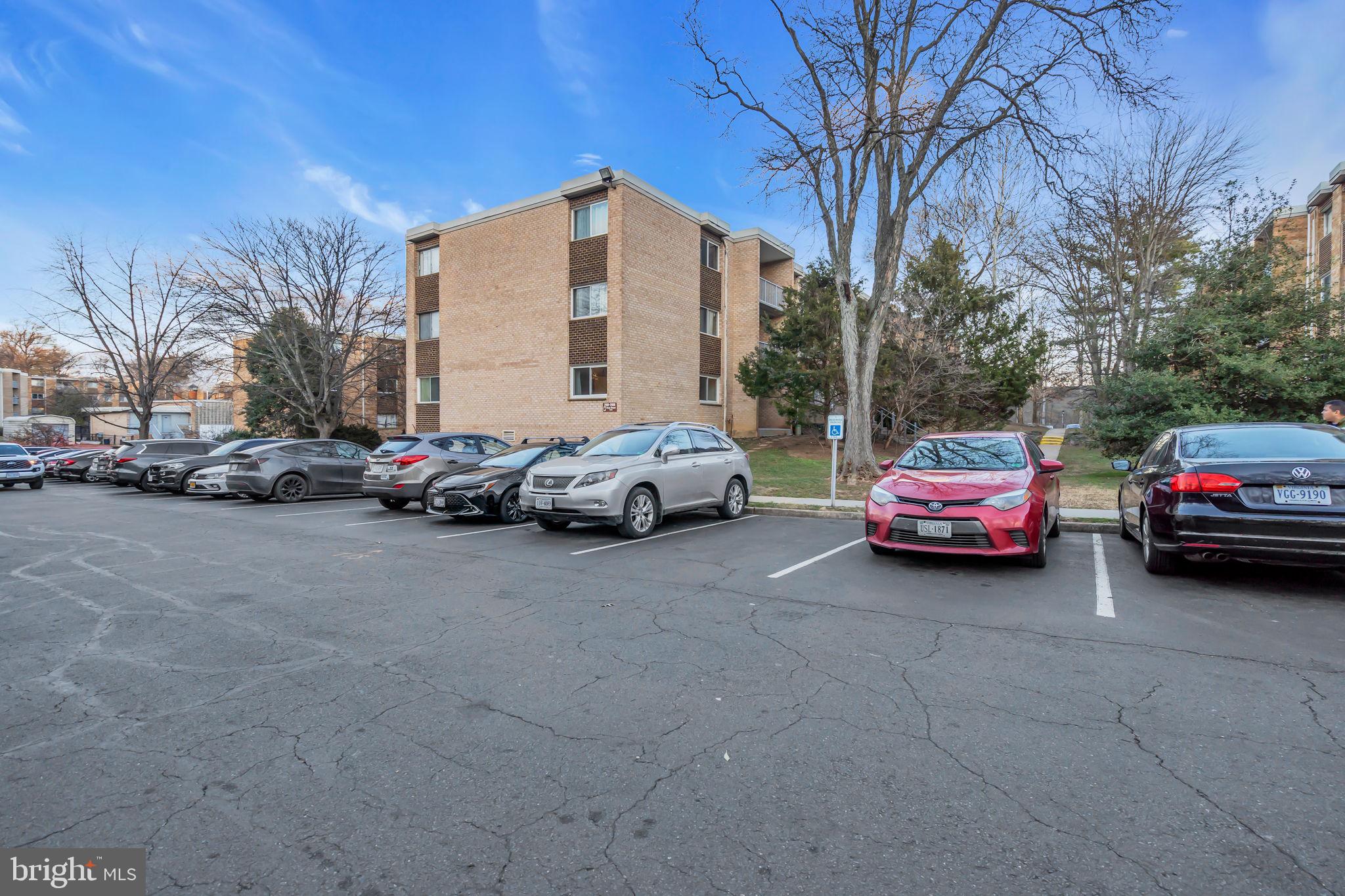 2910 Kings Chapel Road, Unit 5 Falls Church, VA 22042 - Photo 24 of 25 a view of a cars parked in front of a house