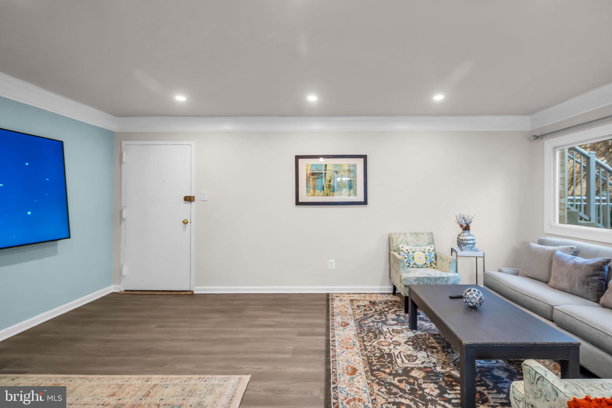 2910 Kings Chapel Road, Unit 5 Falls Church, VA 22042 - Photo 5 of 25 a living room with furniture and a couch
