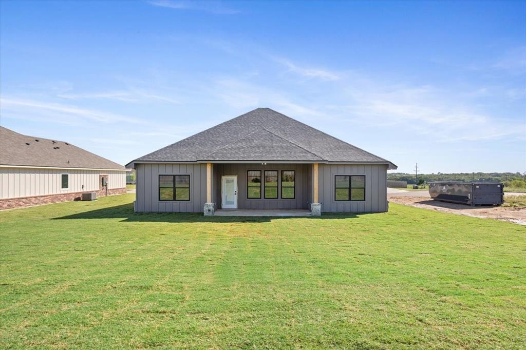 112 Great Trail Road Riesel, TX 76682 - Photo 26 of 28 a house with swimming pool in front of it