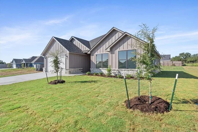 a house view with a garden space