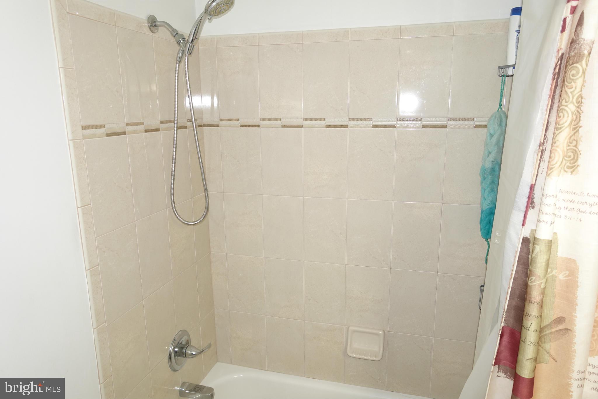 2019 Ray Leonard Road Landover, MD 20785 - Photo 7 of 19 a bathroom with a glass shower door