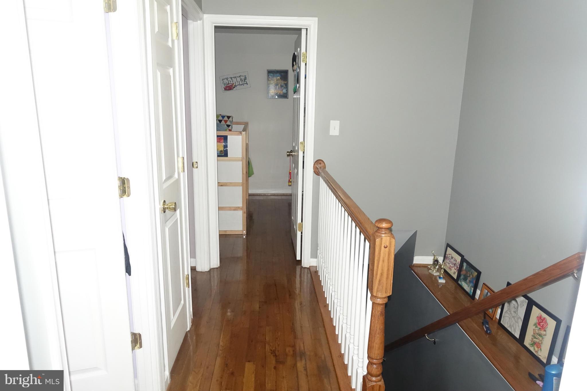 2019 Ray Leonard Road Landover, MD 20785 - Photo 9 of 19 a view of a hallway with wooden floor and entryway