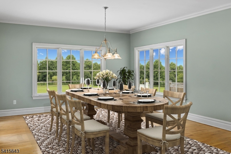 7 Timber Ridge Road Far Hills, NJ 07931 - Photo 11 of 48 a view of a dining room with furniture wooden floor and chandelier