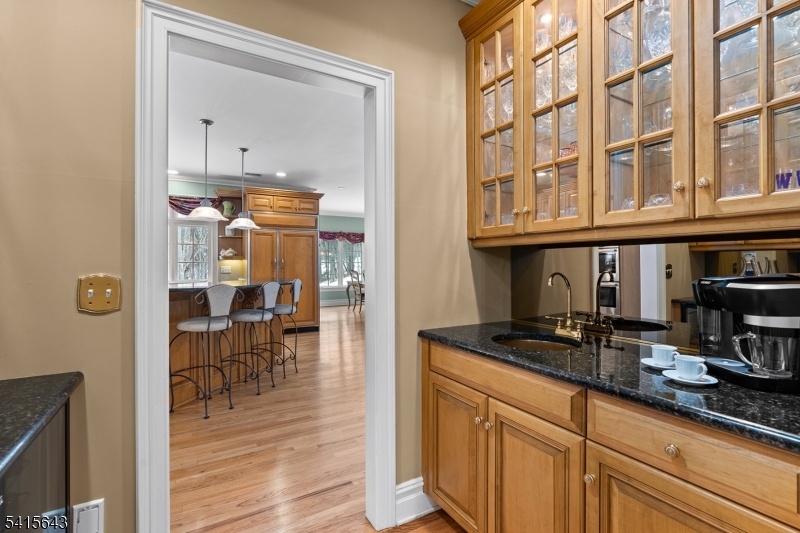 7 Timber Ridge Road Far Hills, NJ 07931 - Photo 13 of 48 a kitchen with granite countertop a sink and cabinets