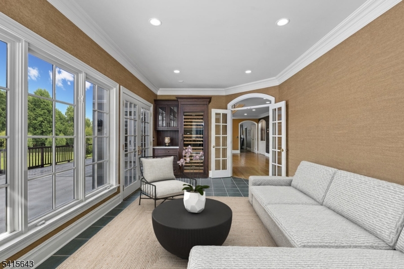 7 Timber Ridge Road Far Hills, NJ 07931 - Photo 20 of 48 a living room with furniture and a large window