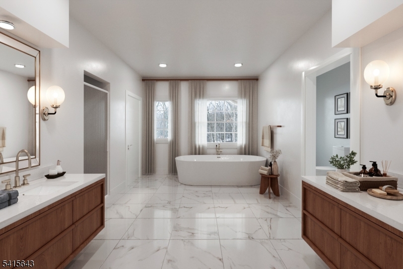 7 Timber Ridge Road Far Hills, NJ 07931 - Photo 29 of 48 a bathroom with a tub sink and mirror