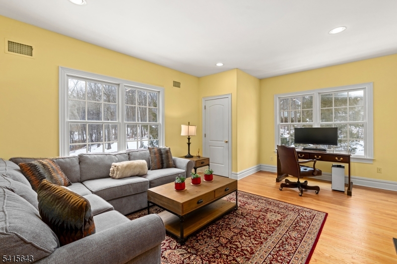 7 Timber Ridge Road Far Hills, NJ 07931 - Photo 32 of 48 a living room with furniture and a flat screen tv
