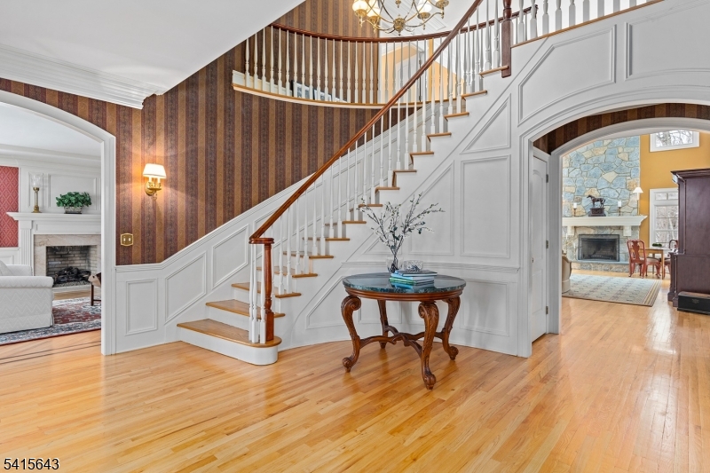 7 Timber Ridge Road Far Hills, NJ 07931 - Photo 4 of 48 a view of entryway and hall with wooden floor