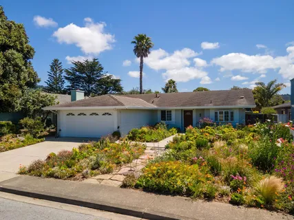 front view of a house with a yard