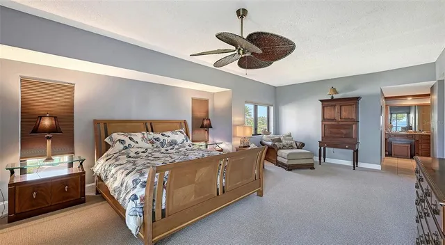 a spacious bathroom with a sink a mirror and a shower