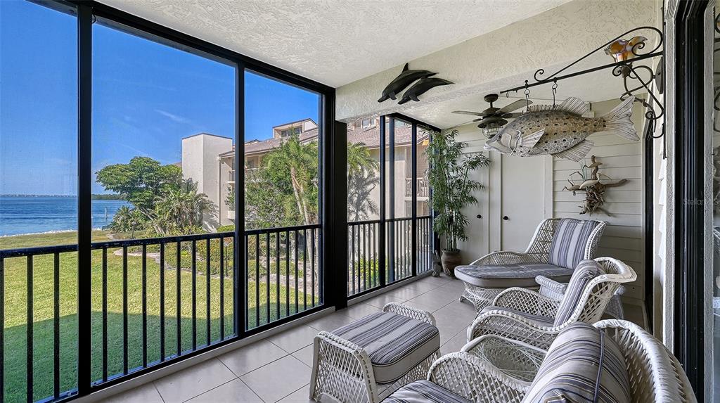 3850 Mariners Walk, Unit 714 Cortez, FL 34215 - Photo 24 of 59 a view of balcony with furniture