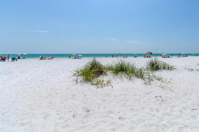 a view of a balcony with wooden floor and city view