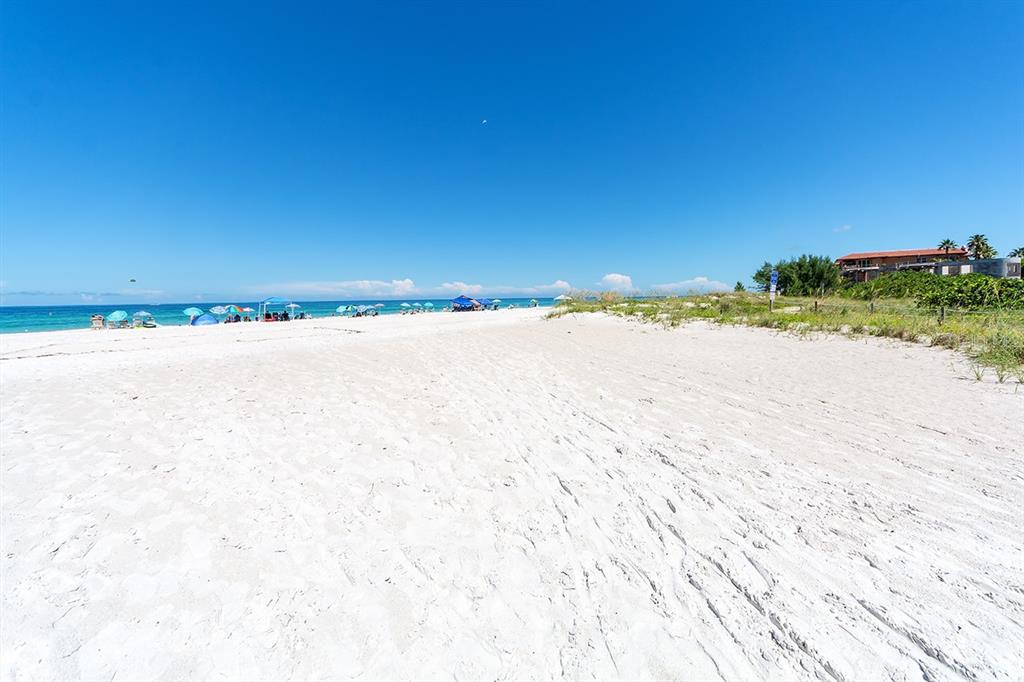3850 Mariners Walk, Unit 714 Cortez, FL 34215 - Photo 53 of 59 a view of an ocean and beach