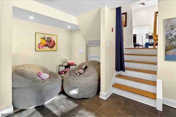 a view of a living room with entryway