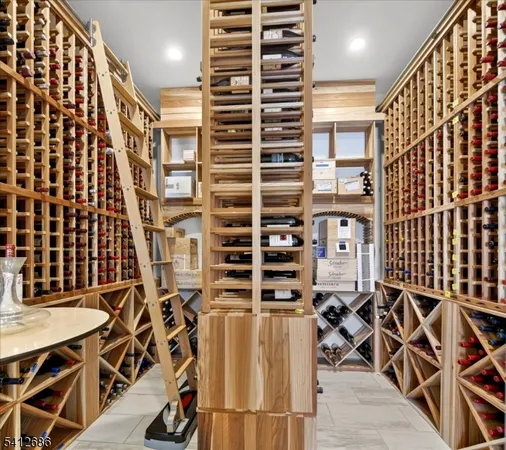 a kitchen with stainless steel appliances granite countertop a refrigerator stove and sink