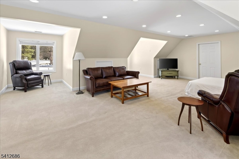 947 Cherry Hill Road Princeton, NJ 08540 - Photo 41 of 45 a living room with furniture and a flat screen tv