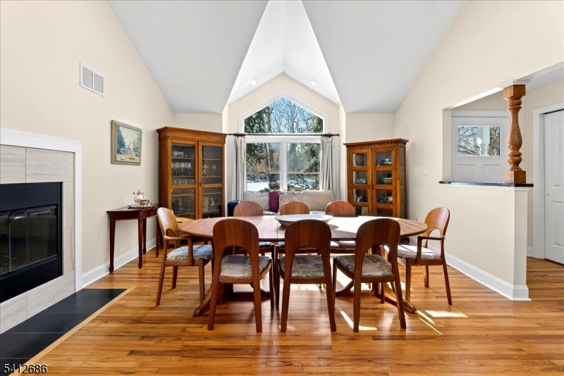 947 Cherry Hill Road Princeton, NJ 08540 - Photo 6 of 45 a view of a dining room with furniture window and wooden floor