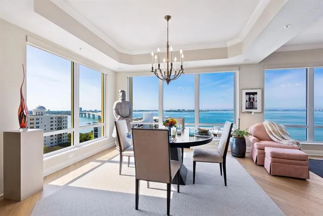 a living room with furniture or couch and a bookshelf