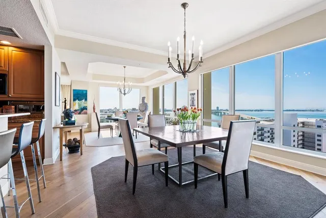 a large spacious bathroom with a large tub shower and sink