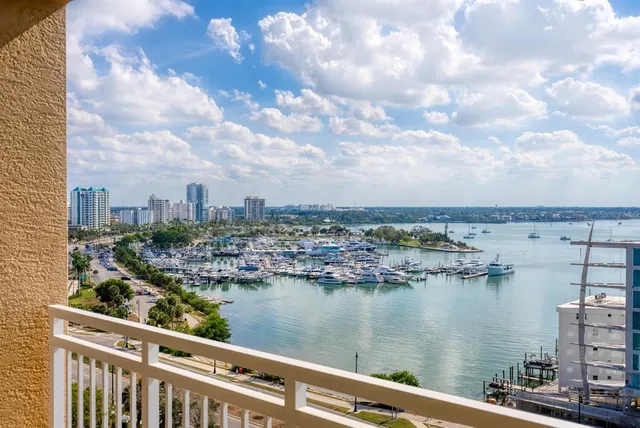 a bedroom with a bed dresser and a window
