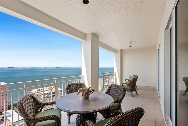 a bathroom with a double vanity sink mirror and shower