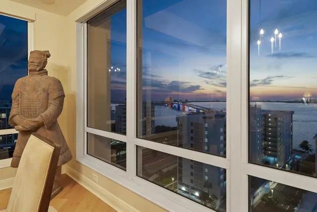 a utility room with cabinets washer and dryer