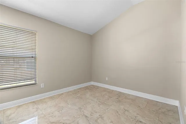 an empty room with a window