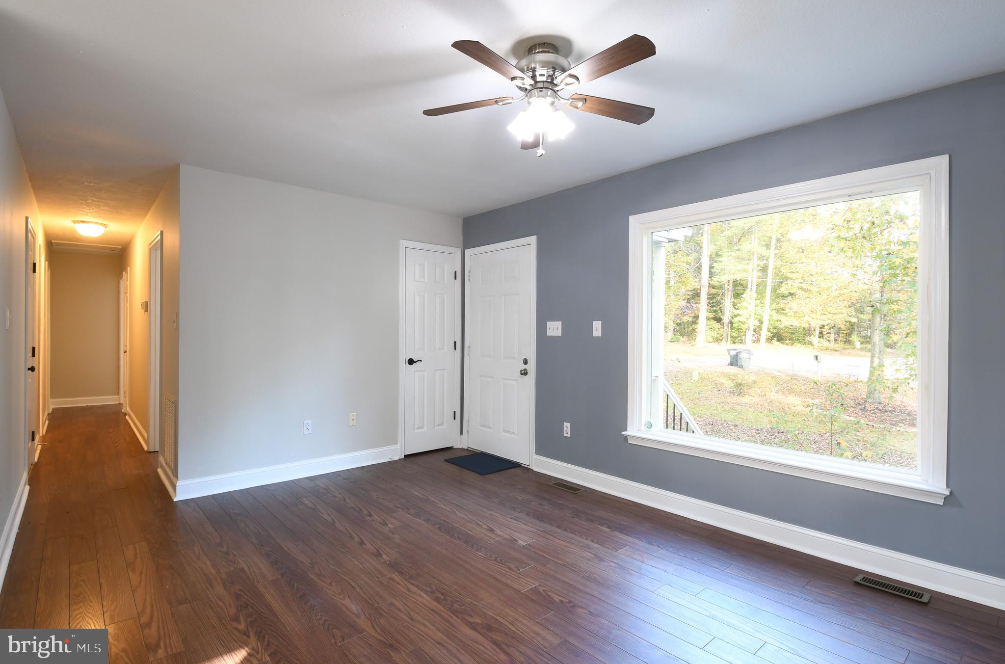 7 Ingram Court Ruther Glen, VA 22546 - Photo 12 of 37 Living room with pretty view of front yard
