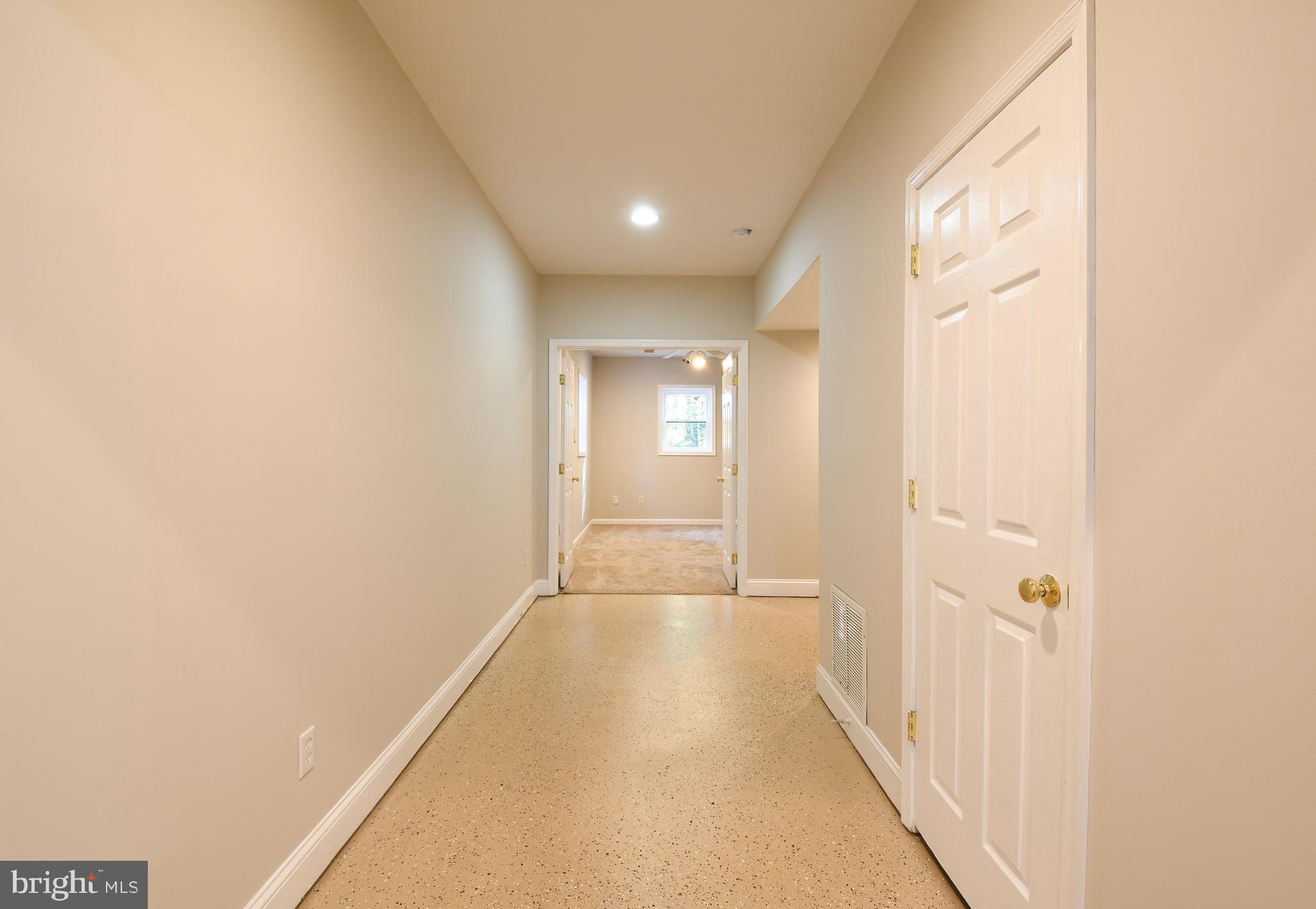 7 Ingram Court Ruther Glen, VA 22546 - Photo 30 of 37 Lower level hallway