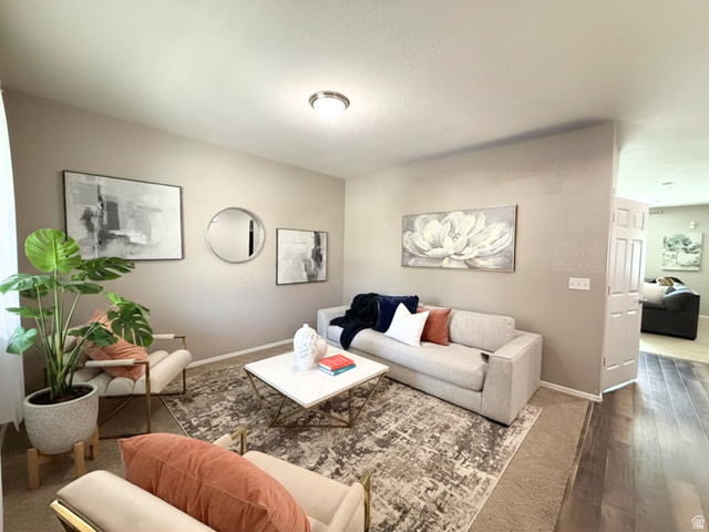 3293 East Osprey Way Layton, UT 84040 - Photo 6 of 27 Neutral-toned walls complement the wood-finish flooring