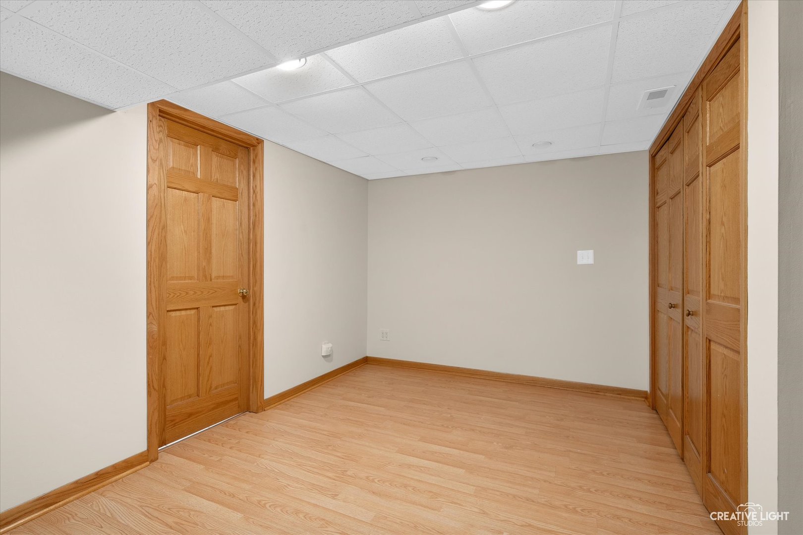 131 Terry Drive Sugar Grove, IL 60554 - Photo 17 of 27 an empty room with wooden floor and windows