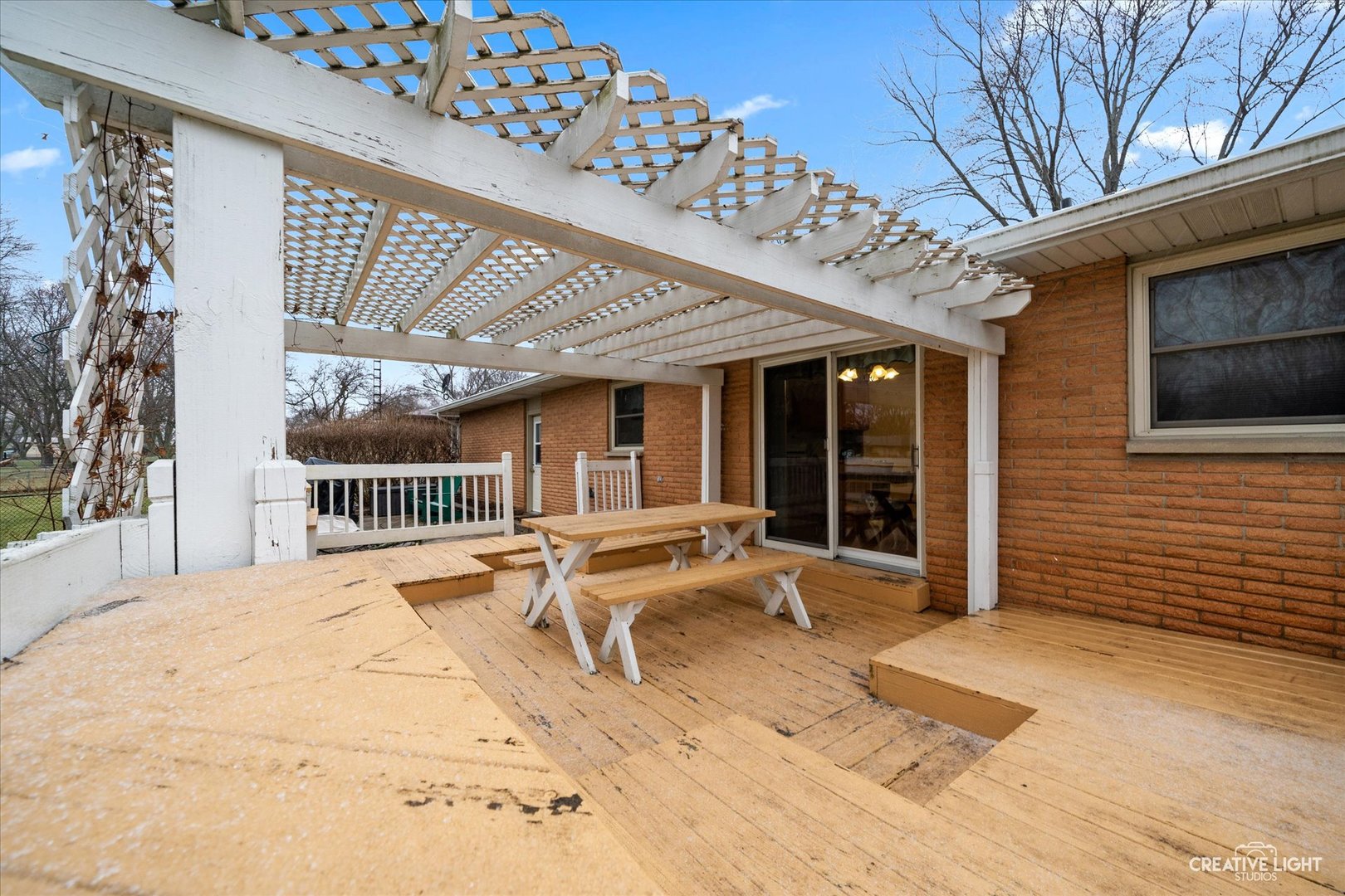 131 Terry Drive Sugar Grove, IL 60554 - Photo 24 of 27 a balcony with hardwood filled with table and chairs