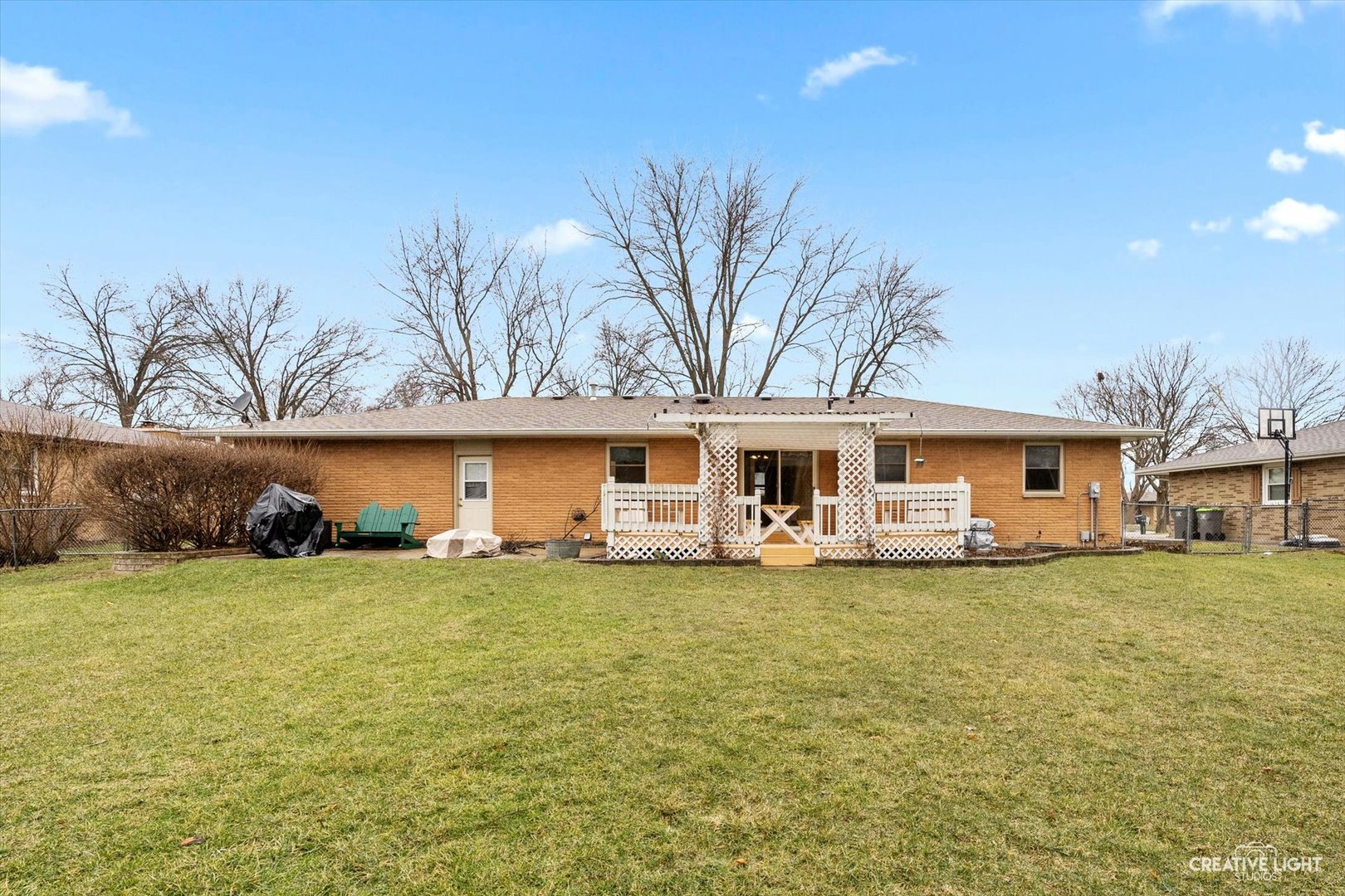 131 Terry Drive Sugar Grove, IL 60554 - Photo 27 of 27 a view of a house with a big yard and large trees