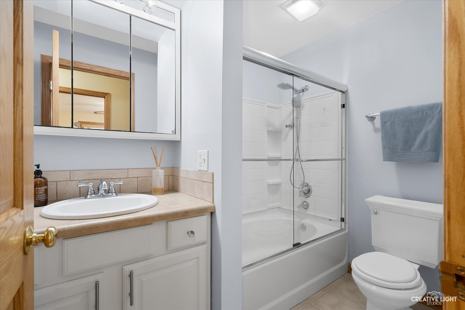 131 Terry Drive Sugar Grove, IL 60554 - Photo 8 of 27 a bathroom with a sink toilet vanity and shower